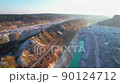 Anthropogenic landscape in open cast. Walking dragline excavator on development chalk open pit. 90124712