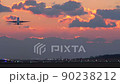 Airplane taking off from Kumamoto Airport after sunset 90238212