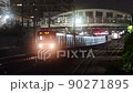 JR Chuo Line down train leaves Hachioji Station (night view) 90271895