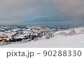 Moving white clouds blue sky scenic aerial view. Timelapse high back in blue sky through the fluffy clouds in the evening at the bright sun. Sun is hidden behind the clouds at sunset the fog 90288330