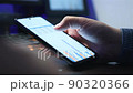 Businessman Using Mobile Phone With Start Up Statistics. 90320366