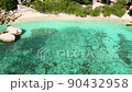 4K Aerial drone top down view bird eye view of sea waves, rock and sand. Beautiful of sea water wave come to beach. Phuket Thailand tropical beach. 90432958