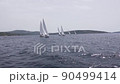 Sailing yachts on the regatta in the Adriatic Sea 90499414
