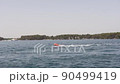 Small rubber boat with motor. Adriatic sea 90499419