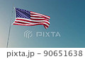 Flag On A Flagpole Against The Sky Loop 90651638