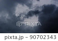 Chaotic dark clouds surrounded by all-sky rain clouds 90702343