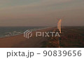 海と風力発電と夕日の空撮 90839656