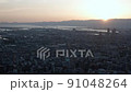 大阪の日の入りから夕景のタイムラプス動画ズームアウト 91048264
