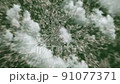 Zooming on Moscow, Russia. Earth zoom in from outer space to city. The animation continues by zoom out through clouds and atmosphere into space. View of the Earth at night. Images from NASA. 4K 91077371