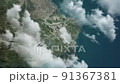 Zooming on Taipei, Taiwan. Earth zoom in from outer space to city. The animation continues by zoom out through clouds and atmosphere into space. View of the Earth at night. Images from NASA. 4K 91367381