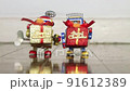 two retro robots bring presents a stop motion film	 91612389