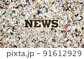 the word NEWS being covered in cut up news paper stop motion loop 91612929