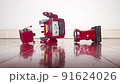 the red retro robot is broken (system fail concept ) stop motion loop	 91624026