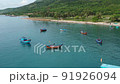 Top view, aerial view fishing harbor market from a drone. Royalty high-quality free stock video footage of Ninh Van fishing harbour or fishing village. Fishing harbor is a popular tourist destination 91926094
