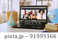 laptop with people having virtual birthday party 91995366