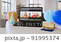 laptop with family having virtual birthday party 91995374