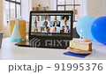 laptop with people having virtual birthday party 91995376