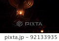 Lamp lights in a mountain lodge at night 92133935