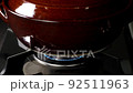 土鍋でご飯を炊く　強火にかける 92511963