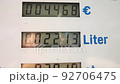 Close-up detail view of fuel pump digital display showing high rising super and diesel gasoline petrol price at gas refueling station in EU country. Energy cost raised expenses due war crisis Europe 92706475