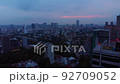 Drone moving above the skyscrapers of Mexico city at sunset with pinkish sky 92709052