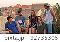 Young Diverse Group Of Friends Having Fun And Taking Photos On A Road Trip Through Europe Travel Lifted Happiness And Destination Exploration Tourism As A Family Together Love Summer Concept 92735305