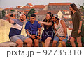 Diverse Young Friends Having Fun And Taking Photos On A Road Trip Through Europe Travel Lifestyle Happiness And Destination Exploration Tourism As A Family Together Love Summer Concept 92735310