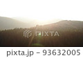 Morning natural landscape in mountains. Bright sun blinds eyes 93632005