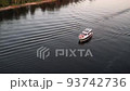 Aerial drone top view with copy space of luxury speed boat cruising in high speed in blue sea. Reflection of the sailing yatch and golden sunset in water. Leisure time at nautical vessel in the ocean  93742736