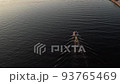Aerial drone top view with copy space of luxury speed boat cruising in high speed in blue sea. Reflection of the sailing yatch and golden sunset in water. Leisure time at nautical vessel in the ocean 93765469