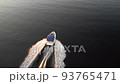 Aerial drone top view with copy space of luxury speed boat cruising in high speed in blue sea. Reflection of the sailing yatch and golden sunset in water. Leisure time at nautical vessel in the ocean 93765471