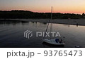 Aerial drone top view with copy space of luxury speed boat cruising in high speed in blue sea. Reflection of the sailing yatch and golden sunset in water. Leisure time at nautical vessel in the ocean 93765473