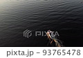 Aerial drone top view with copy space of luxury speed boat cruising in high speed in blue sea. Reflection of the sailing yatch and golden sunset in water. Leisure time at nautical vessel in the ocean 93765478