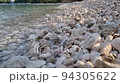View of beautiful footage while big sea waves breaking on the coastline. Beautiful sunrise over the Adriatic sea. Makarska Riviera-Biokovo, Dalmatia, Croatia, Europe 94305622