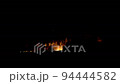Long shot of forest fire engulfing forest at Netarhat, Jharkhand India. 94444582