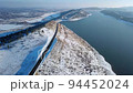 Vehicles On Narrow Road By A Cliffside In Horsetooth Reservoir - aerial shot 94452024