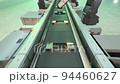 robot conveyor for the production of mobile phones at a high-tech factory. 3d rendering 94460627