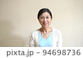Middle-aged woman nodding with a smile 94698736