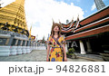 Asian woman in the dress traveling at Wat Phra Kaew or Emerald buddha temple in Bangkok Thailand 94826881