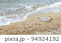 PET bottle washed up on the sandy beach 1 94924192