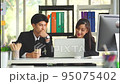 Young Business couple office worker is working together on a computer in office. 95075402