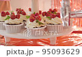 Muffins on birthday raspberry berries and cream 95093629