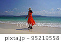woman relaxing on the beach 95219558