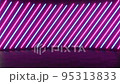Seamless looping of Cyberpunk circus striped neon light rotating background. Purple and blue light color concept. 95313833