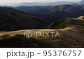 Aerial View of Montenegrin mountains near Kolasin during sunrise Aerial View of Montenegrin mountains near Kolasin during sunrise 95376757
