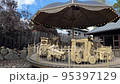 Wooden carousel at Belmontas park in Vilnius, Lithuania 95397129
