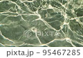 Rippling water surface with light reflection Rippling water surface with light reflection 95467285
