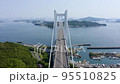 Scenery of Seto Ohashi Bridge and the Seto Inland Sea with cars coming and going 95510825