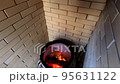 Ignition of coals in a tandoor for preparation of national meat dishes 95631122