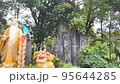The scene of the god of wealth, the lion, the mountains at Le Thi Rieng park, Ho Chi Minh City, Vietnam 95644285